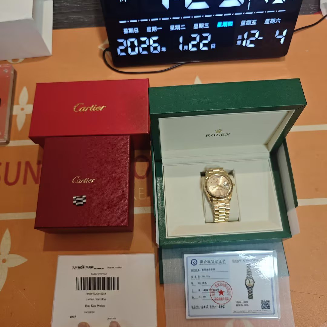 Gold watch unboxing with authentication certificate
