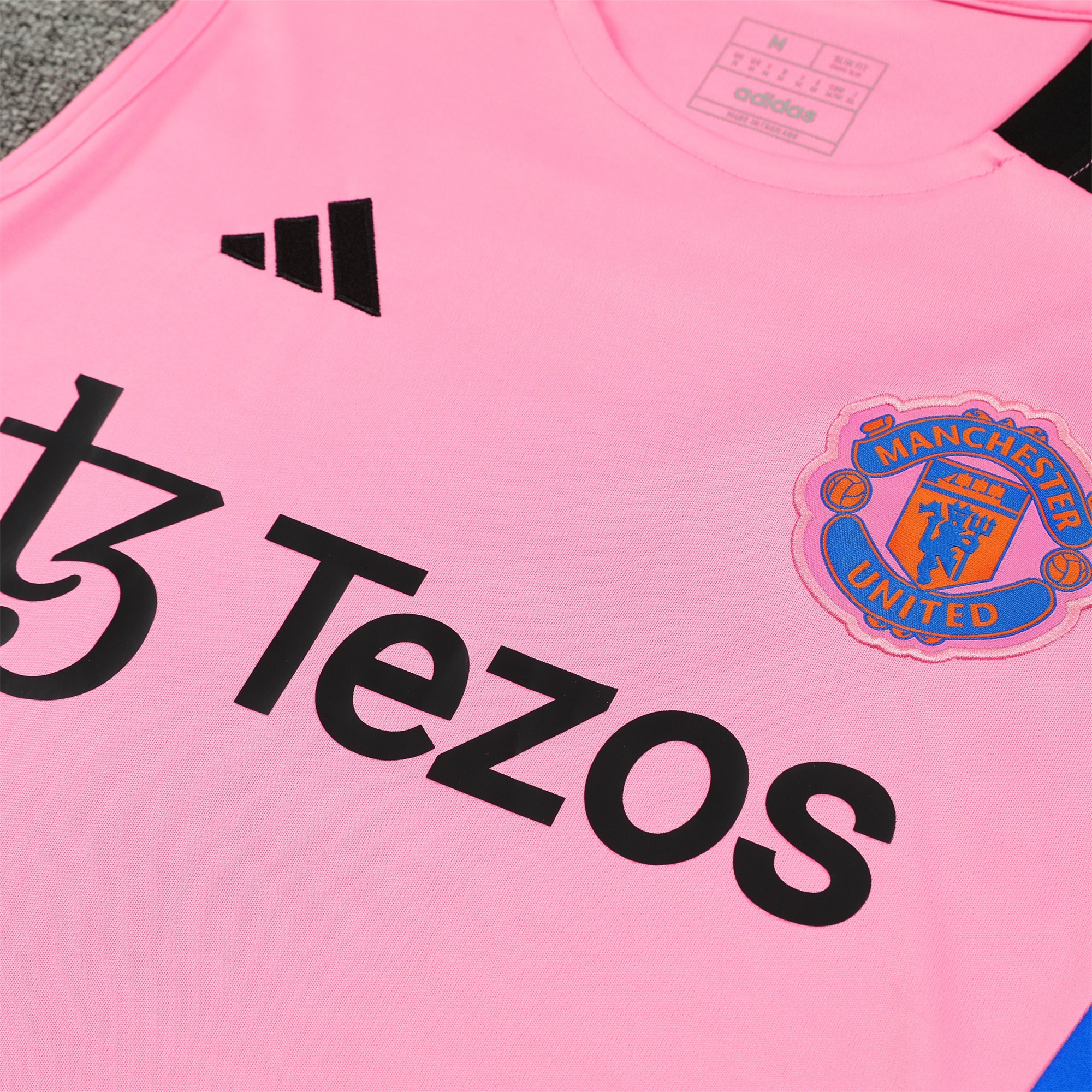 ManixJersey.com | Manchester United 24-25 Vest Training Set - Pink Vest & Black Shorts -Customize Name, Number and Patch | Worldwide Shipping