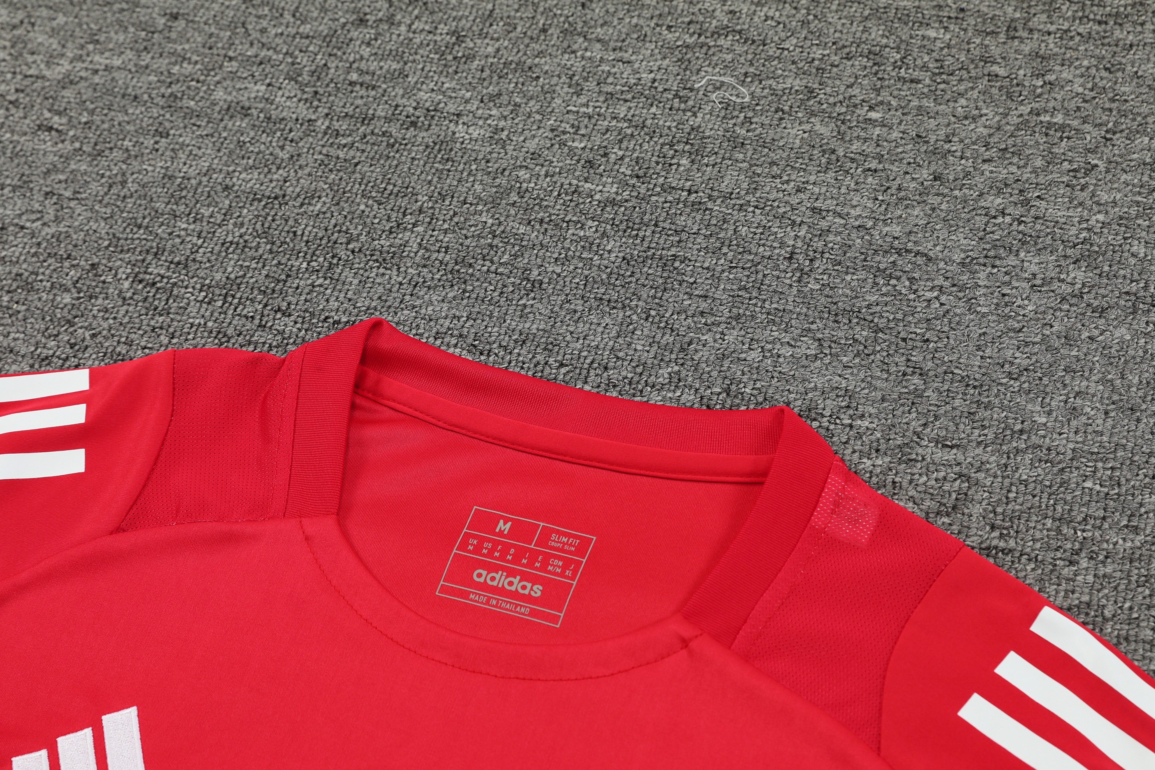 ManixJersey.com | Manchester United 24-25 Short-Sleeve Training Set - Red Top and Black Shorts -Customize Name, Number and Patch | Worldwide Shipping