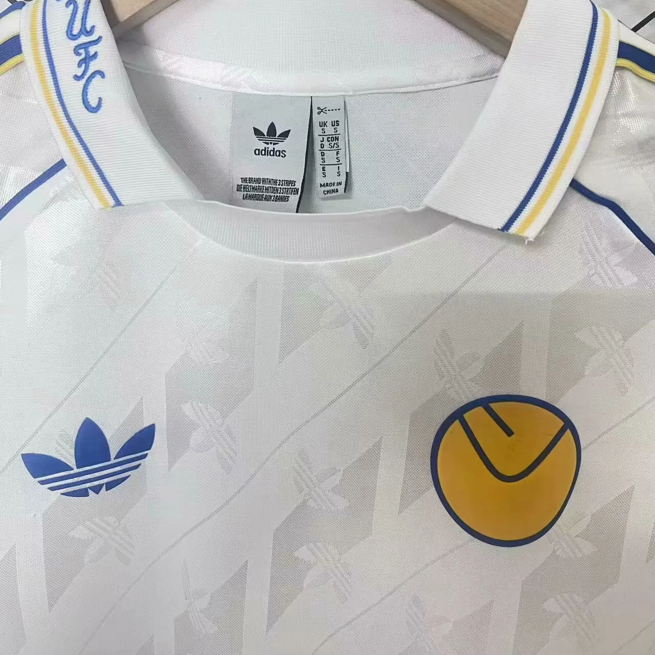 JerseysGala.com | Leeds United 24-25 Spezial Collection White Long Sleeve Polo Shirts -Customize Name, Number and Patch | Worldwide Shipping