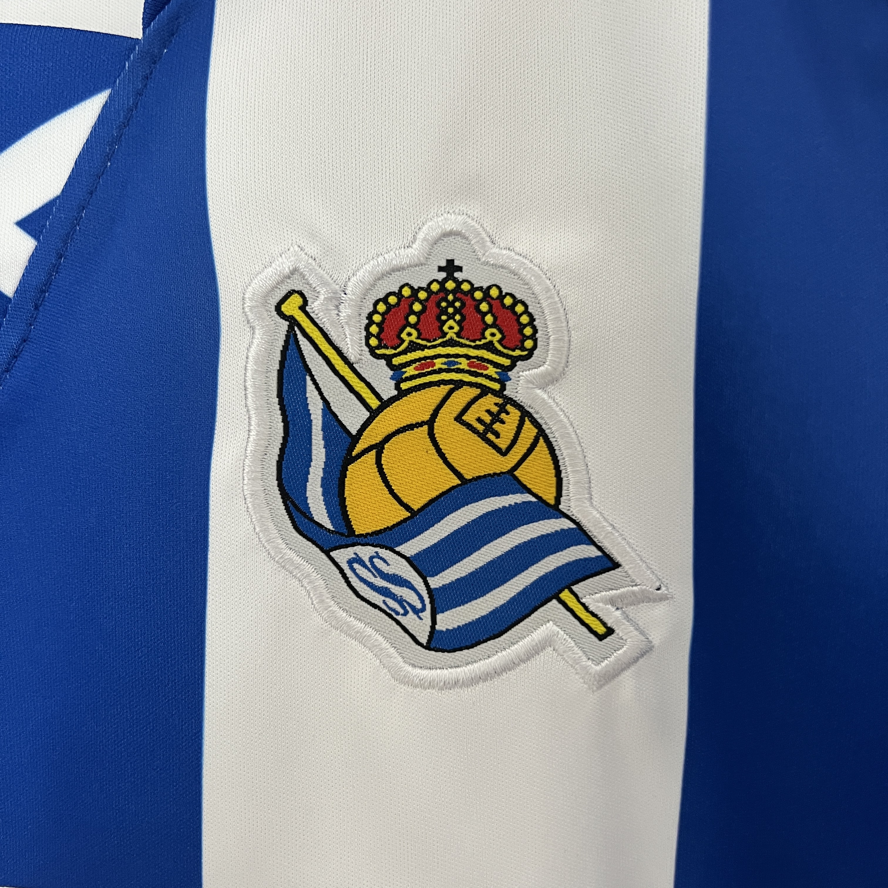 ManixJersey.com | Real Sociedad 24-25 Home Stadium Kids Kit -Customize Name, Number and Patch | Worldwide Shipping