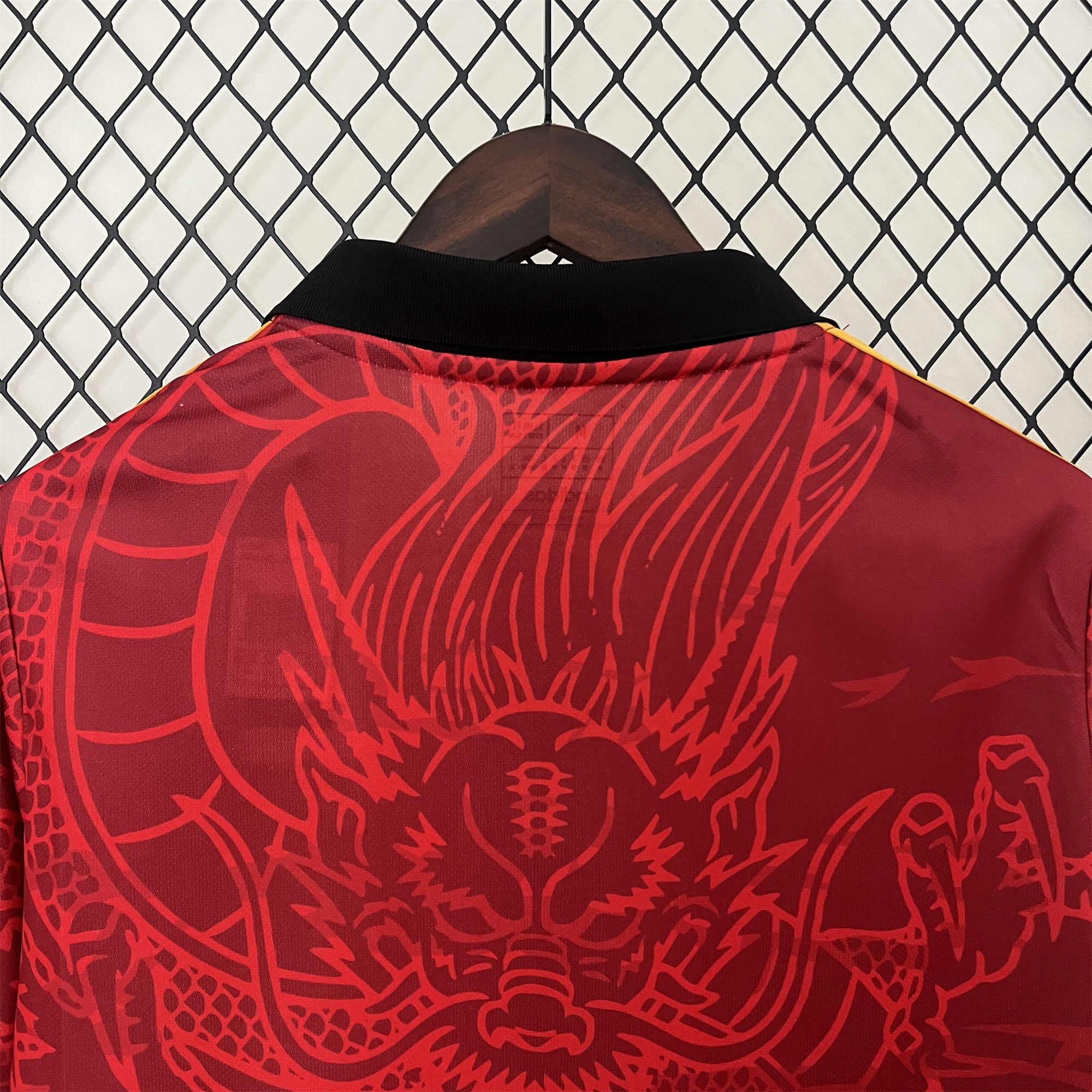 ManixJersey.com | Real Madrid 24-25 Red Colorful Dragon Speical Jersey - Fans Version -Customize Name, Number and Patch | Worldwide Shipping