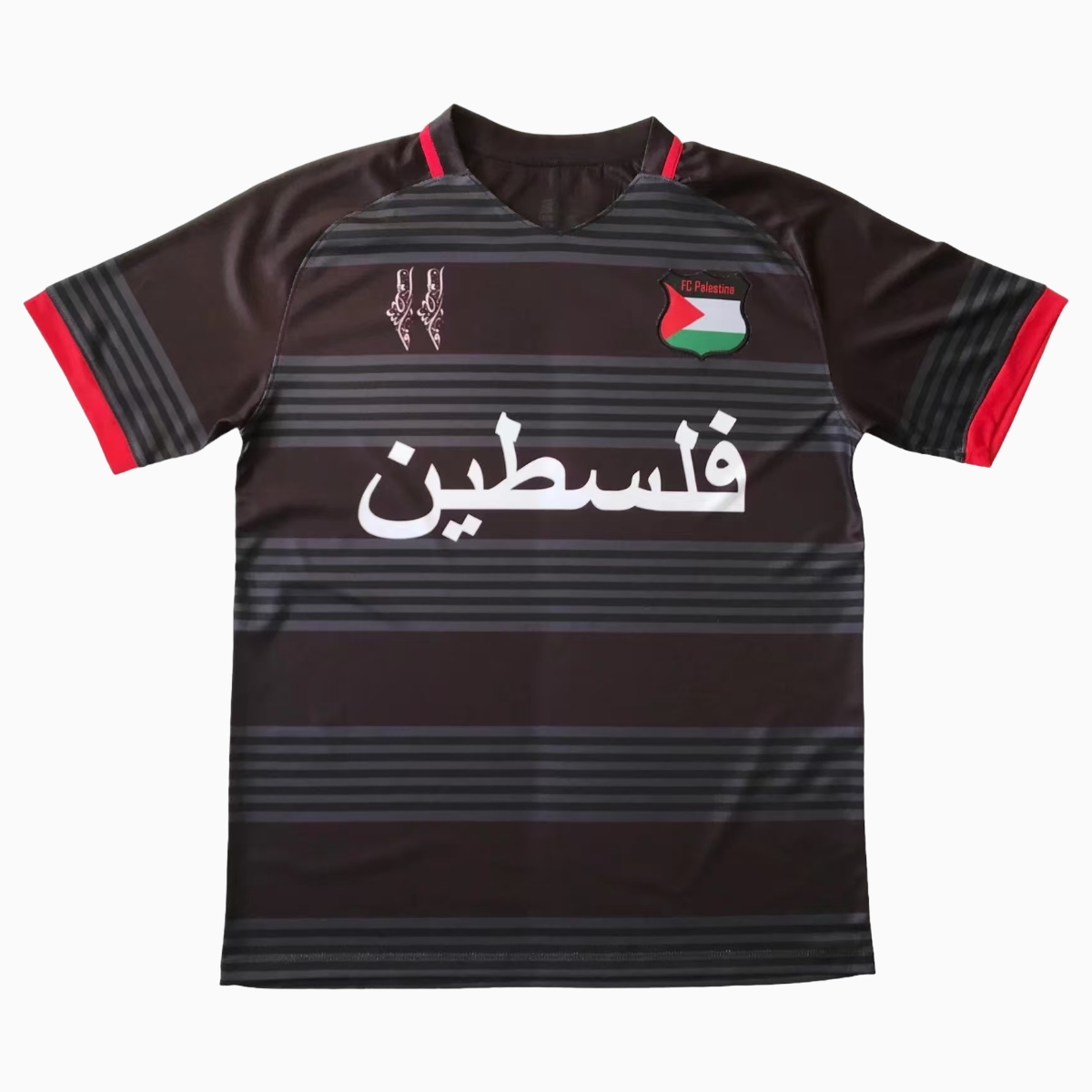 ManixJersey.com | FC Palestina 24-25 Black and Grey Striped Jersey with Arabic and Pattern -Customize Name, Number and Patch | Worldwide Shipping