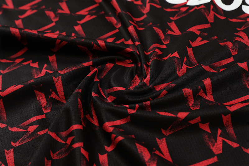 ManixJersey.com | Manchester United 24-25 Short-Sleeve Training Kids Kit - Black Red Camouflage -Customize Name, Number and Patch | Worldwide Shipping