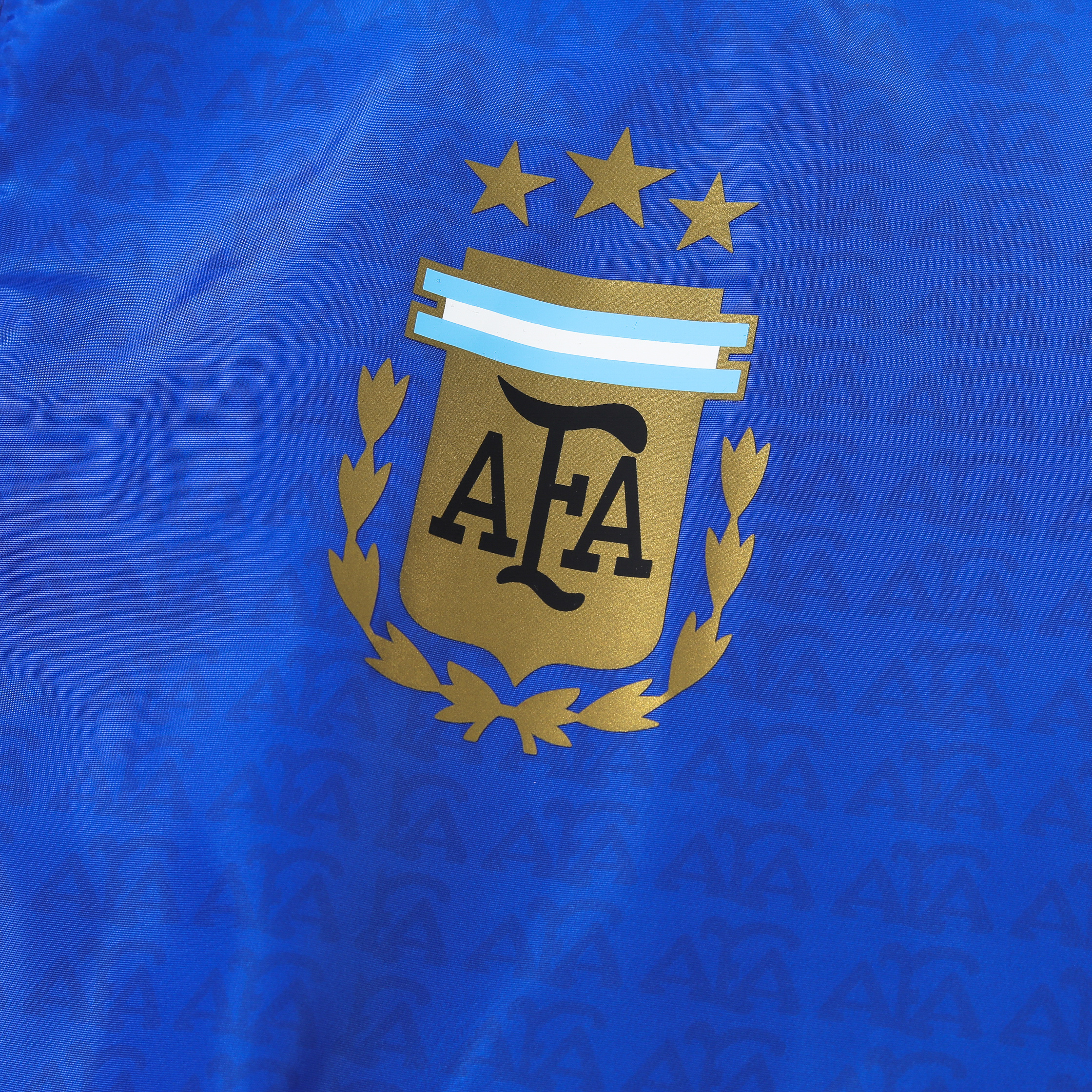 ManixJersey.com | Argentine 2024 Vintage Style Blue Hooded Windbreaker - Player Version -Customize Name, Number and Patch | Worldwide Shipping