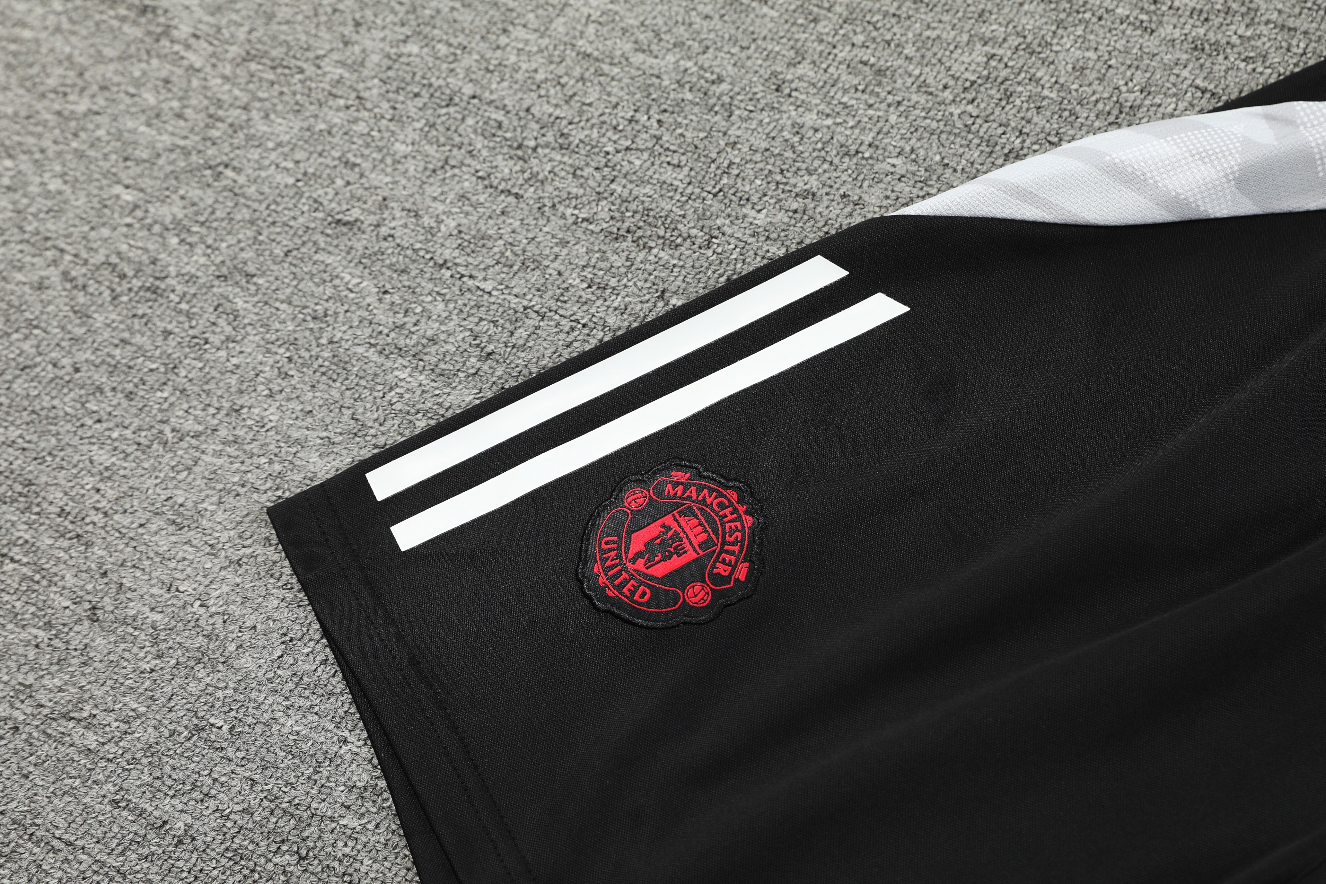 ManixJersey.com | Manchester United 24-25 Short-Sleeve Training Kids Kit - Red Top and Black Shorts -Customize Name, Number and Patch | Worldwide Shipping