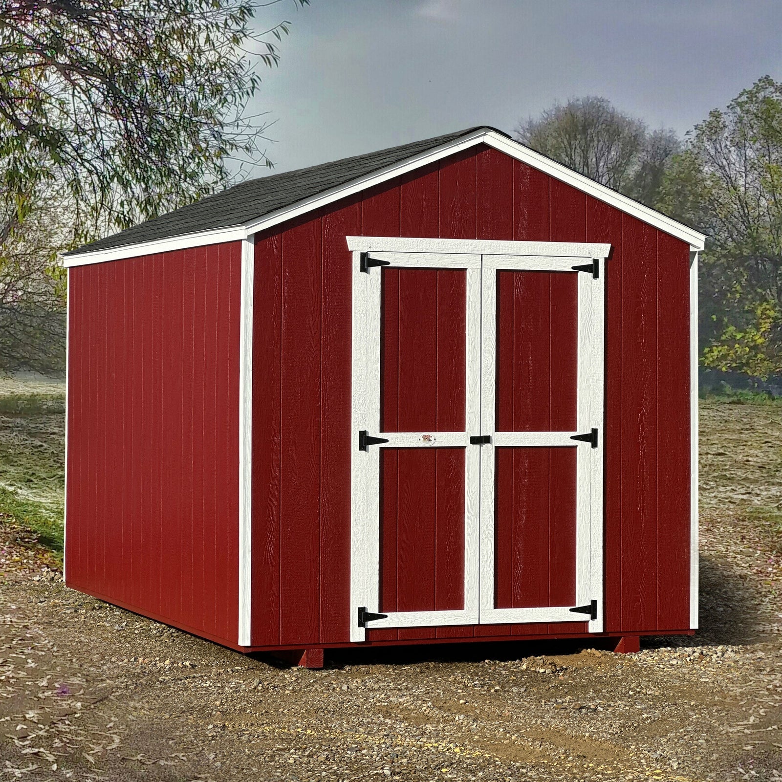 The Value Gable Wooden Shed with its sides painted red with white trims