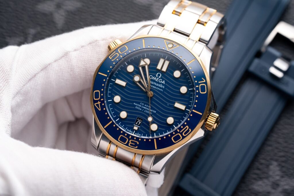Đồng Hồ Omega Seamaster DemiGold Replcia 11 Mặt Xanh 42mm (1)