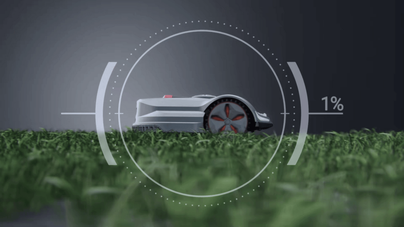 Sunseeker's AWD driving system in action, showcasing the mower's ability to handle up to 70% slopes, providing stability and power on uneven terrains