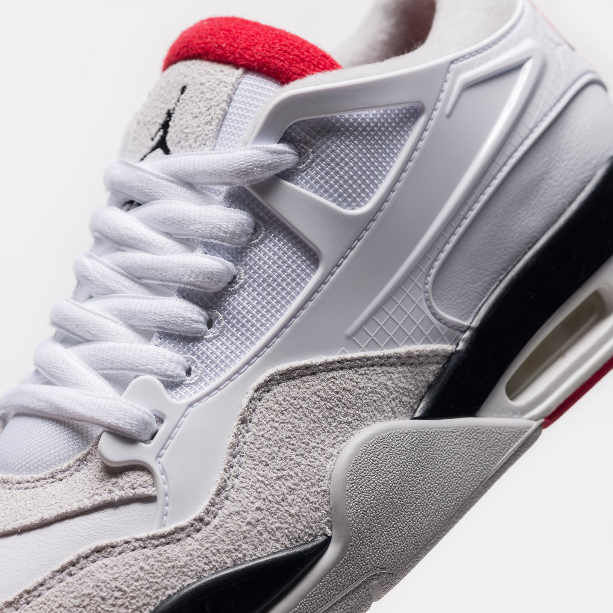 Air Jordan 4 RM Sneaker in White/Varsity Red/Black/Neutral Grey