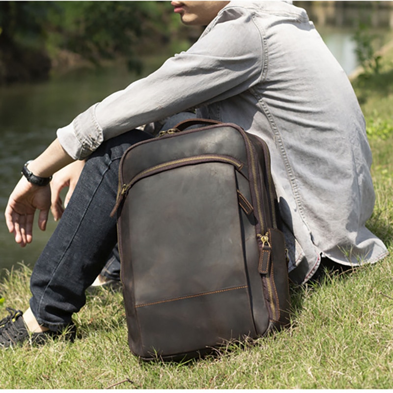 Outdoor Model&nbsp;Show&nbsp;of Woosir Leather Laptop Backpack with Trolley Sleeve and Double Compartments