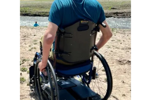 User Enjoying Freedom Trax Near River