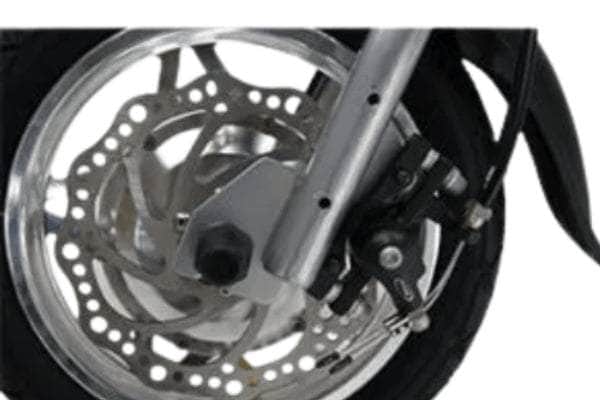 Close-up of the safety system and braking mechanism of the electric wheelchair motor attachment, ensuring enhanced control and security.