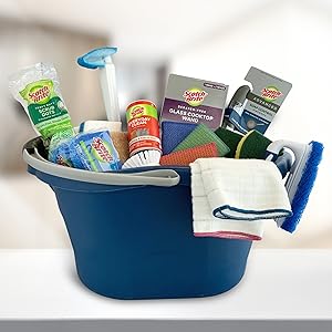 Scotch-Brite products in bucket on kitchen counter