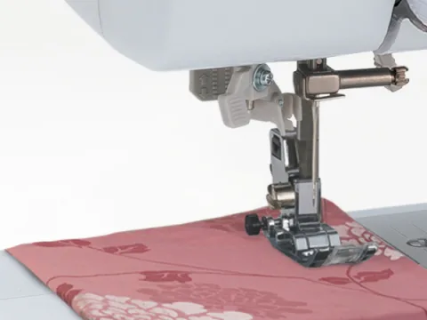 Needle &amp; presser foot section - machine stitching fabric 