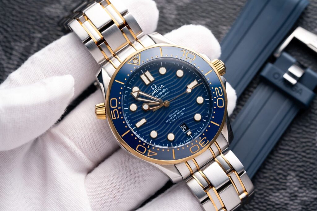 Đồng Hồ Omega Seamaster DemiGold Replcia 11 Mặt Xanh 42mm (1)