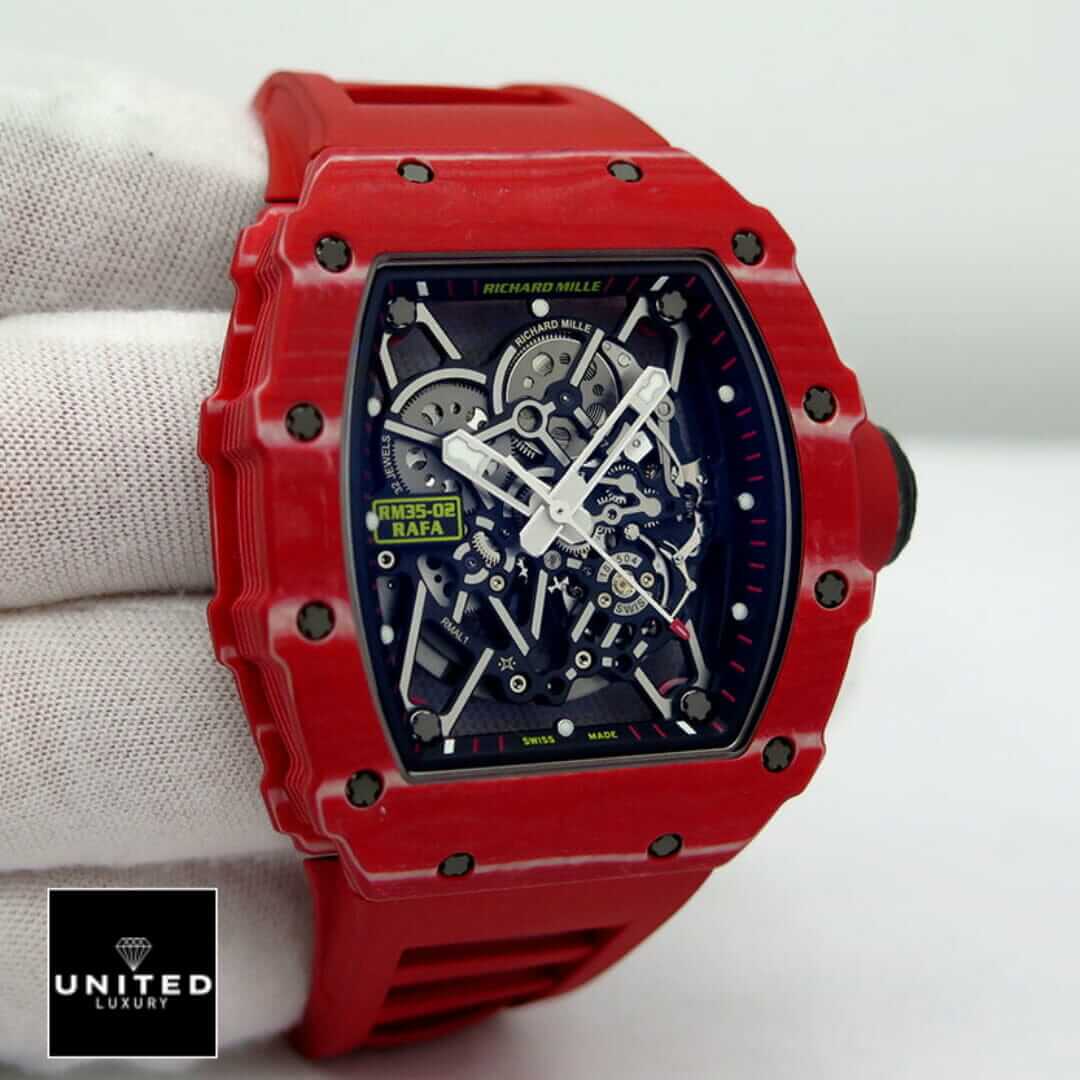 Richard Mille RM35-02 Rafa Black Dial Red Bezel Replica on the glove hand