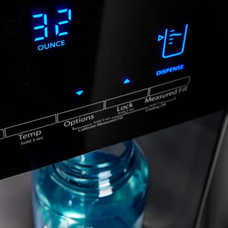 Water dispenser with digital display reading 32 ounces. Water dispenser with digital display reading 32 ounces.