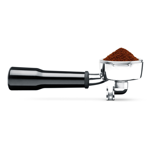 Portafilter filled with freshly grounded coffee.