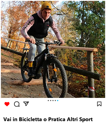 a man riding a bike on a wooden rail