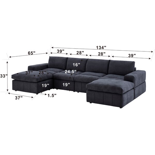 Anchoretta 134" Wide Reversible Modular Sectional with Ottoman