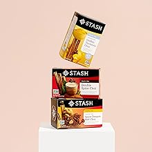 Three stacked boxes of stash tea on a pedestal