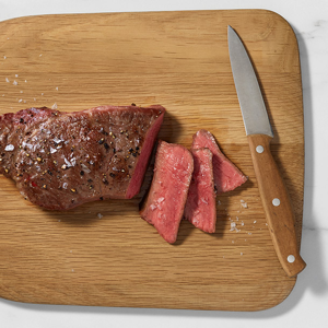 June steak on chopping board