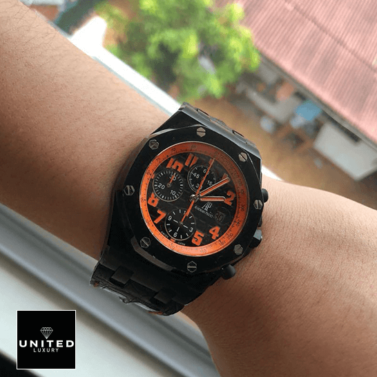 Audemars Piguet Royal Oak Orange Dial Replica on the man wrist