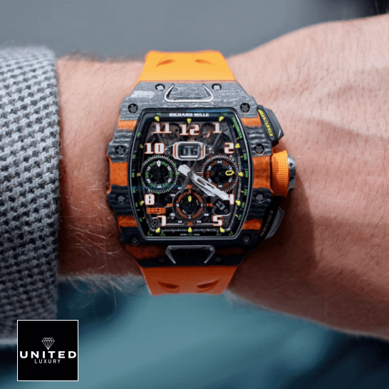 Richard Mille Mclaren hand Orange Rubber Bracelet Replica on the man wrist