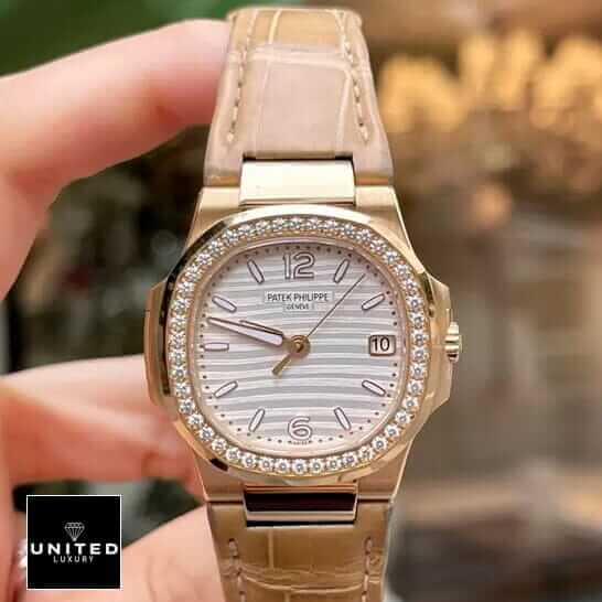 Patek Philippe Nautilus 7010R-011 Replica 4 Patek Philippe Nautilus Leather Bracelet Diamond Bezel Replica on the hand