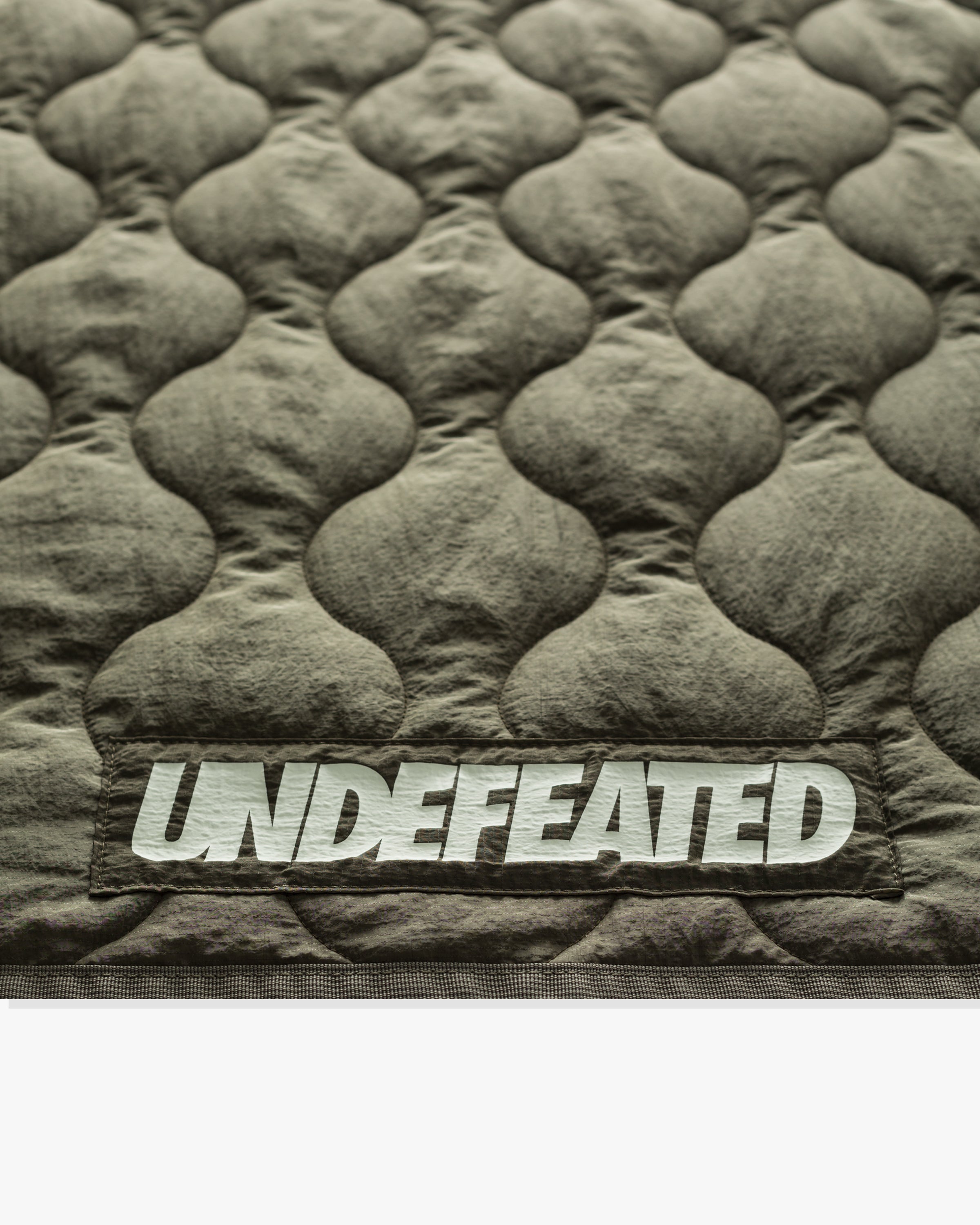 UNDEFEATED QUILTED BLANKET