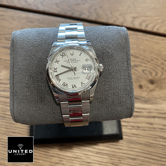 Rolex Datejust 126200-0008 white dial with gray stand