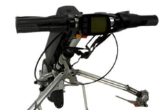 Electric wheelchair motor attachment featuring an LED front light and horn for enhanced nighttime visibility and safety.