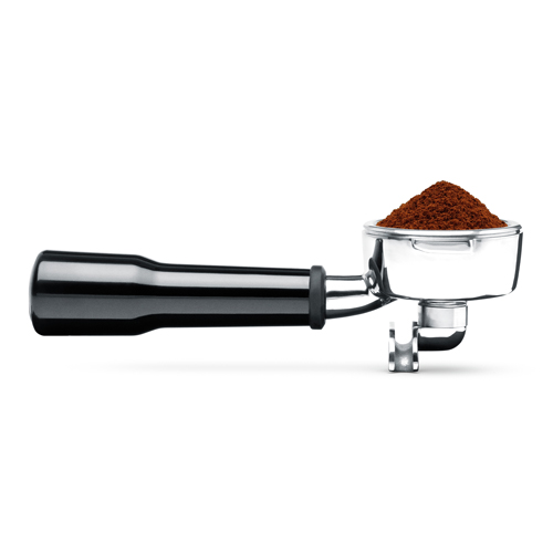 Portafilter filled with freshly grounded coffee.