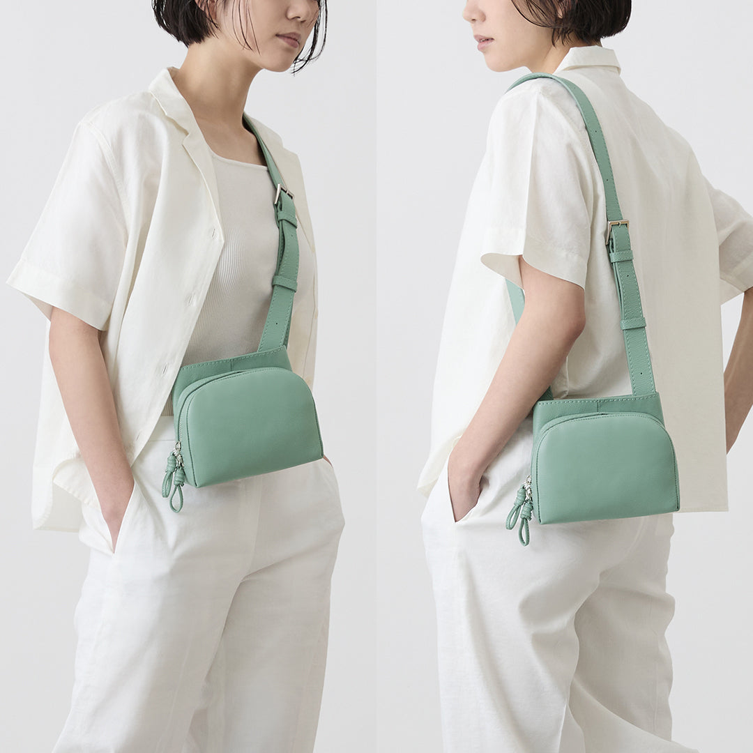 Sora 2 Way Shoulder S: Images of a woman wearing it as a waist pouch and a man wearing it Pouch