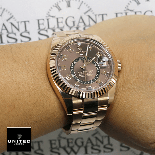 Rose Gold Sky-Dweller Replica 6 Rolex Sky-Dweller Chocolate Dial Rose Gold 326935-0003 Oyster Replica on his arm