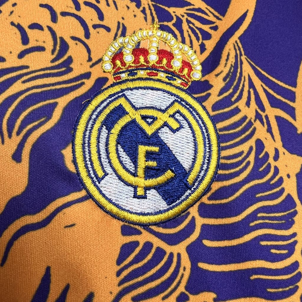 ManixJersey.com | Real Madrid 24-25 Orange Dragon Special Edition Jersey - Fans Version -Customize Name, Number and Patch | Worldwide Shipping