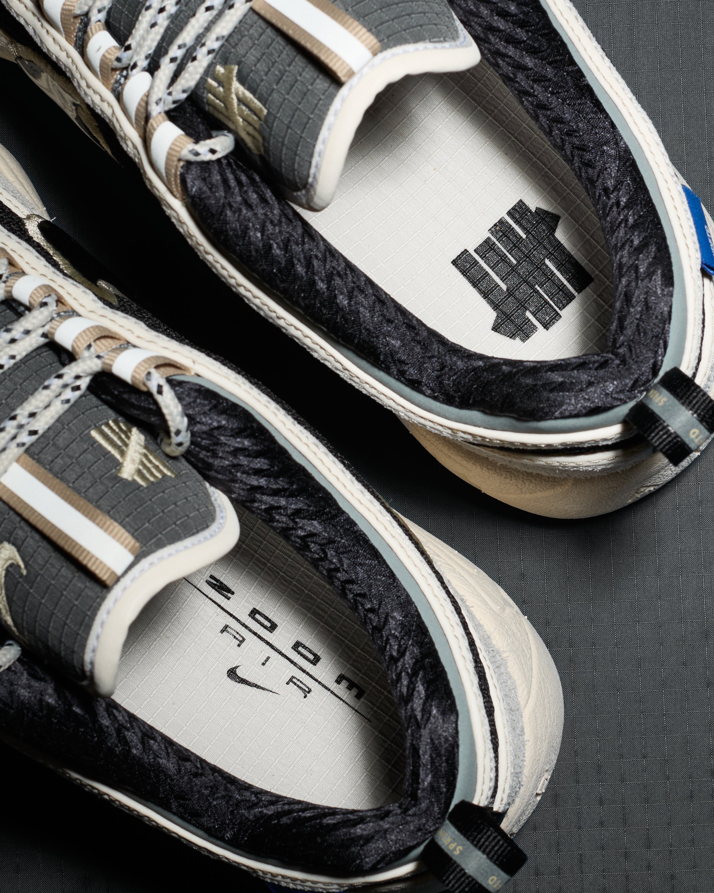 UNDEFEATED X NIKE AIR ZOOM SPIRIDON - PHANTOM/ BLACK