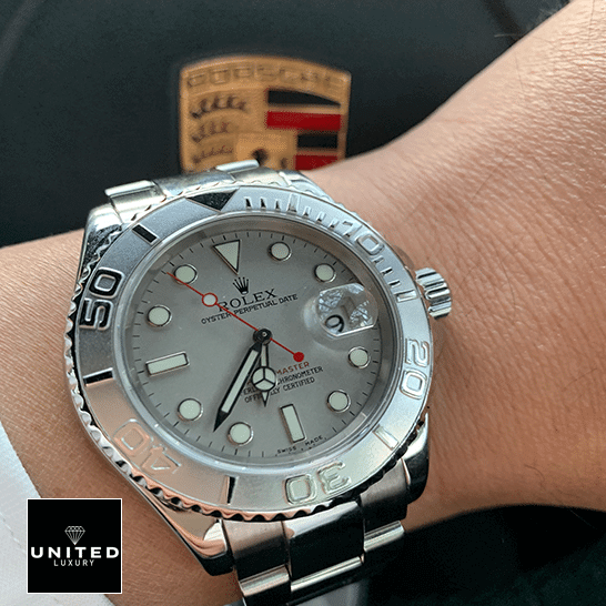 Rolex 116622PLSO Platinum Dial Steel Replica porsche in the background
