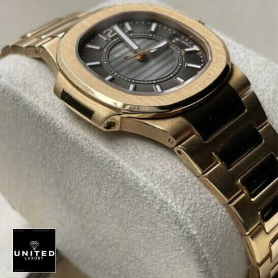 Patek Philippe Nautilus 7011/1R-010 Replica 5 Patek Philippe 7011-1R-010 Black Dial Gold Case Replica on the stand