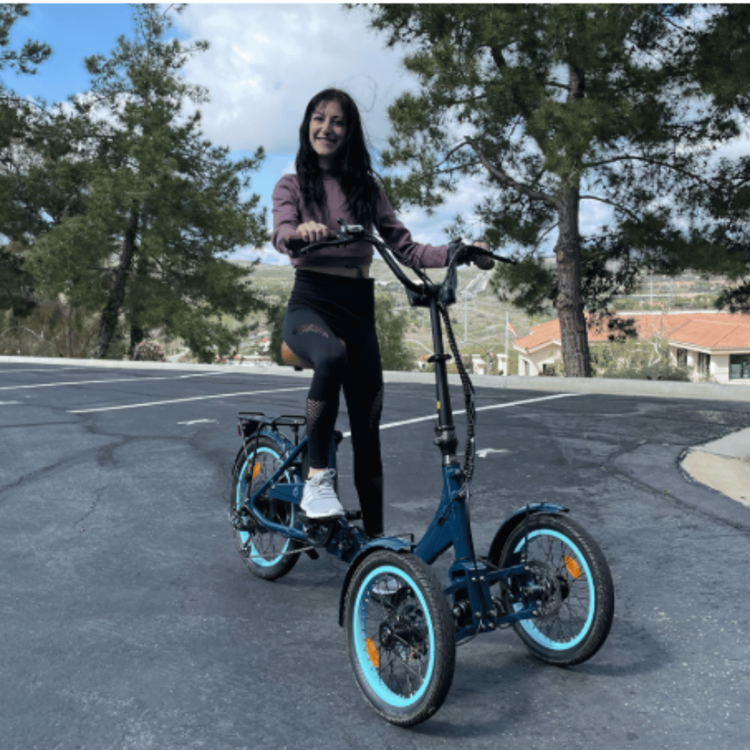 sixthreezero_Two_Front_Wheel_Electric_Bike_with_woman_operating