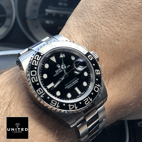 the guy's wearing a Rolex Gmt Master 11610LN-0001.