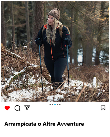 a woman hiking in the woods with ski poles