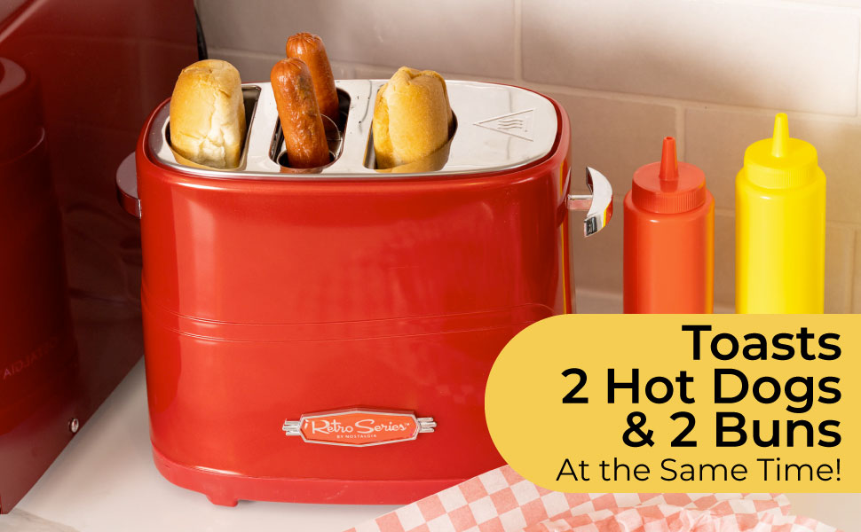 Toasts 2 hot dogs and 2 buns at the same time! Hot dog maker with ketchup and mustard bottles beside