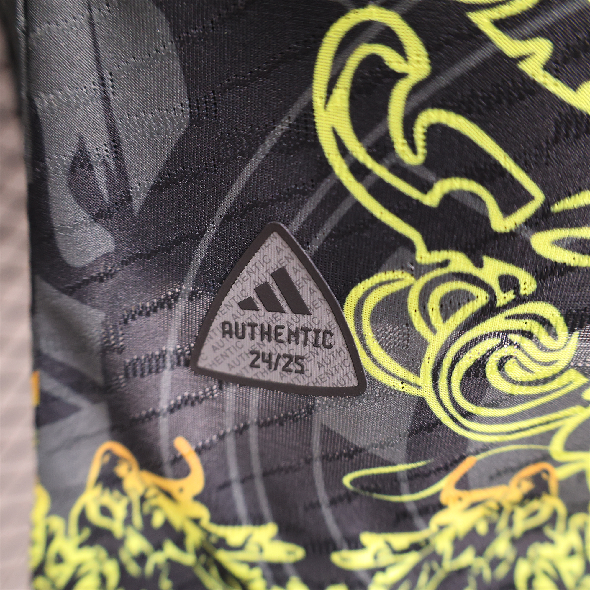 JerseysGala.com | Real Madrid 24-25 Yellow Loong Black Special Edition Jersey - Player Version -Customize Name, Number and Patch | Worldwide Shipping