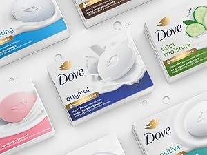 Different Dove beauty bar packs against white background with bubbles. 