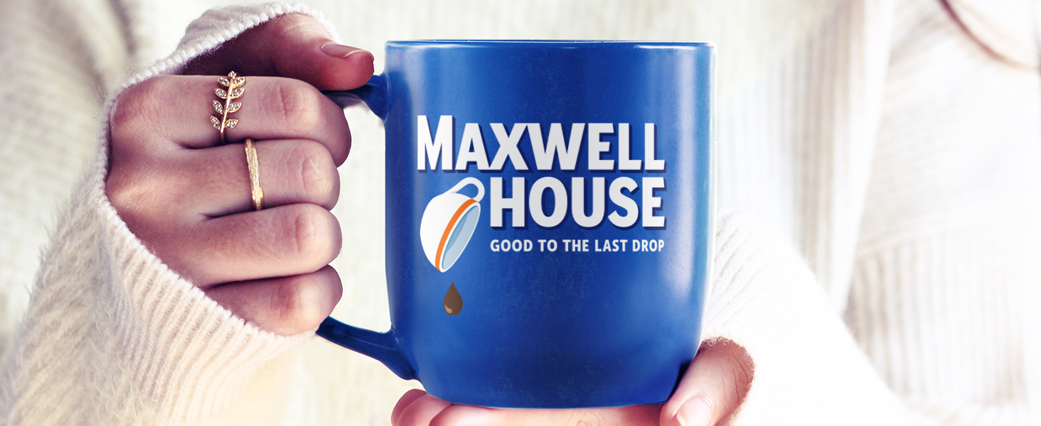 Woman holding mug of Maxwell House coffee