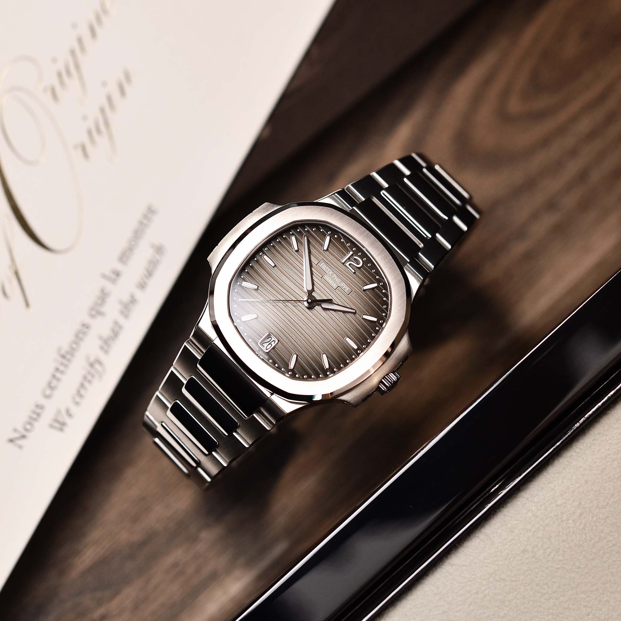 Patek Philippe Ref.7118/1A-011 Nautilus Smoke Gray Dial in Steel with Box &  Cert Dated 2021 – 2ToneVintage Watches Singapore.