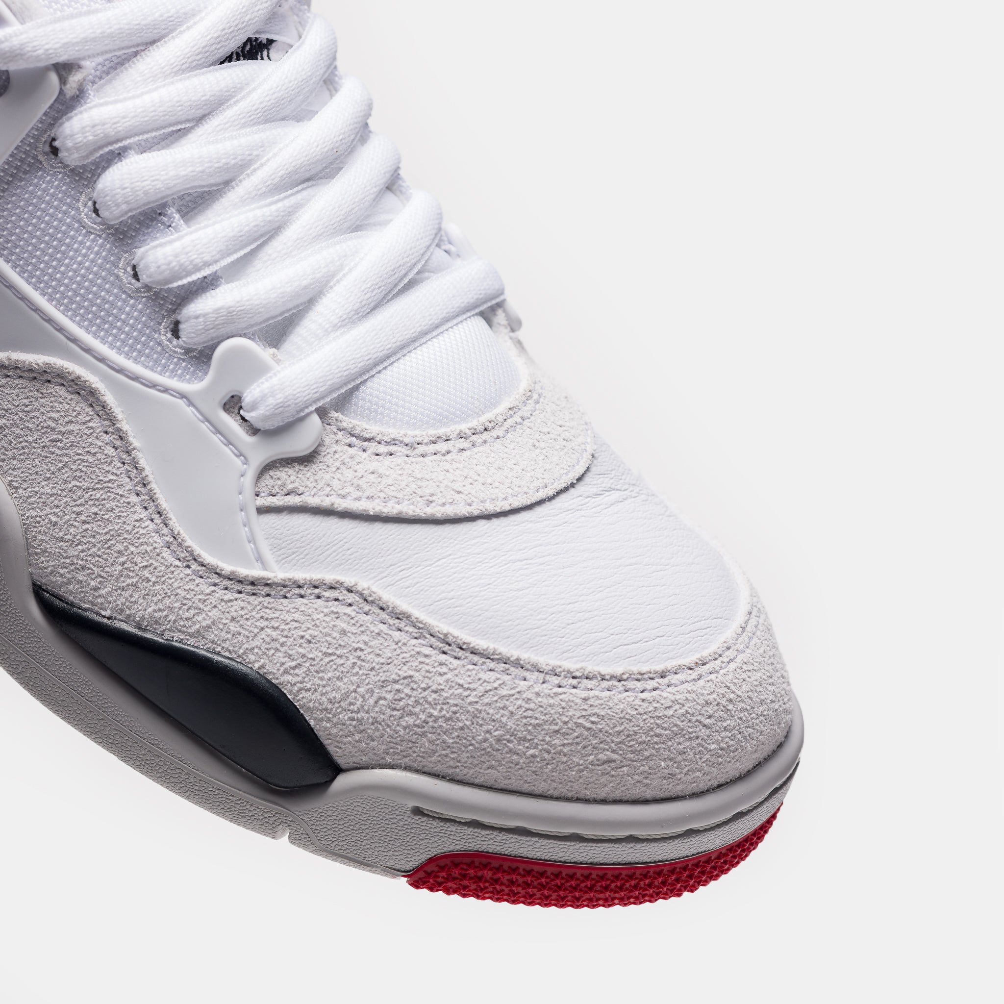 Air Jordan 4 RM Sneaker in White/Varsity Red/Black/Neutral Grey