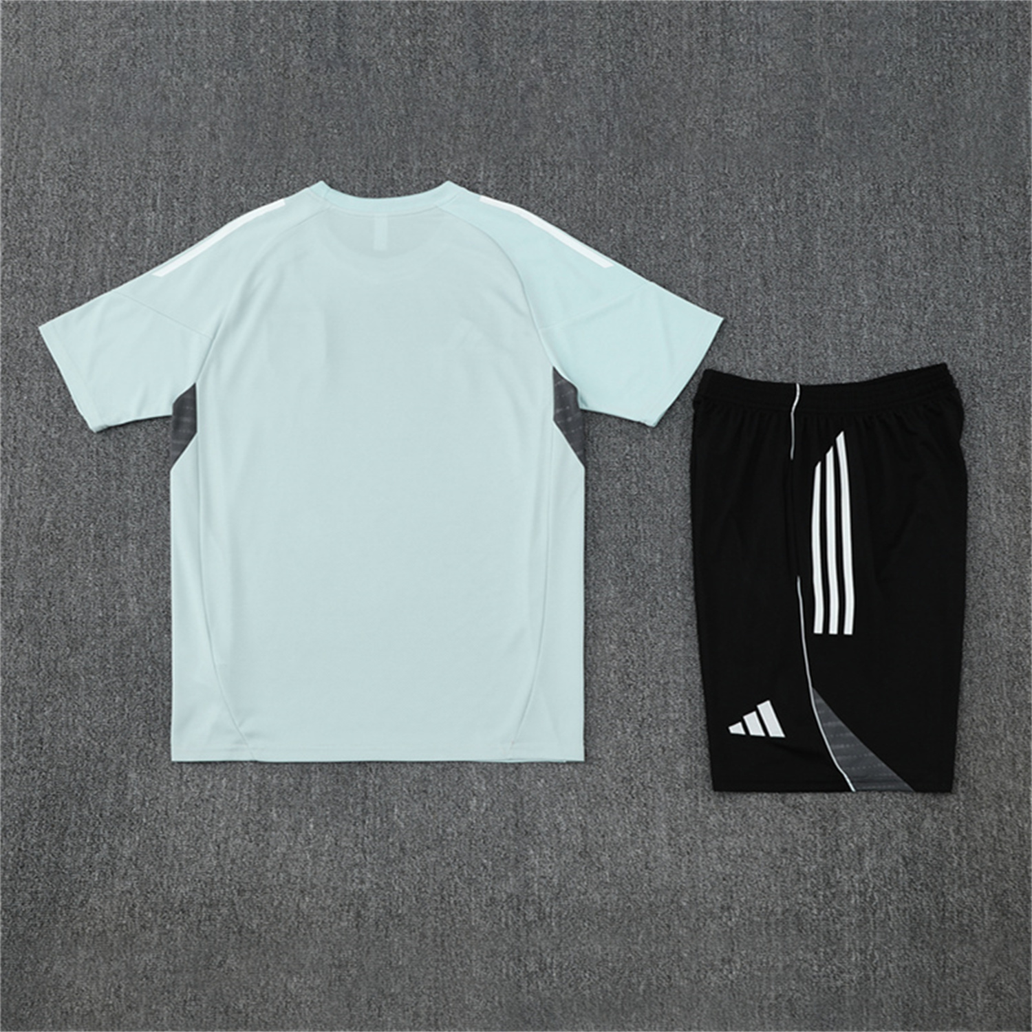 UltraTrikot-Japan 25-26 Kids Short-Sleeve Training Set - Light Blue Top and Black Shorts